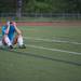 Skyline's goalie Tori Norris hides her face as Pioneer is awarded the district champion trophy, Friday May 31.
Courtney Sacco I AnnArbor.com  